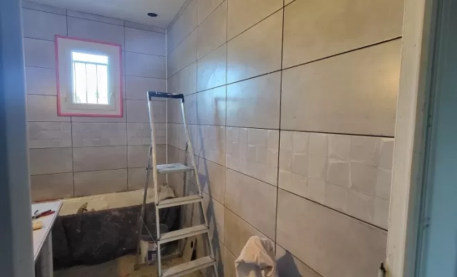 Rénovation salle de bain à Muret, pose faïence sur murs,Chik Peinture & Inside